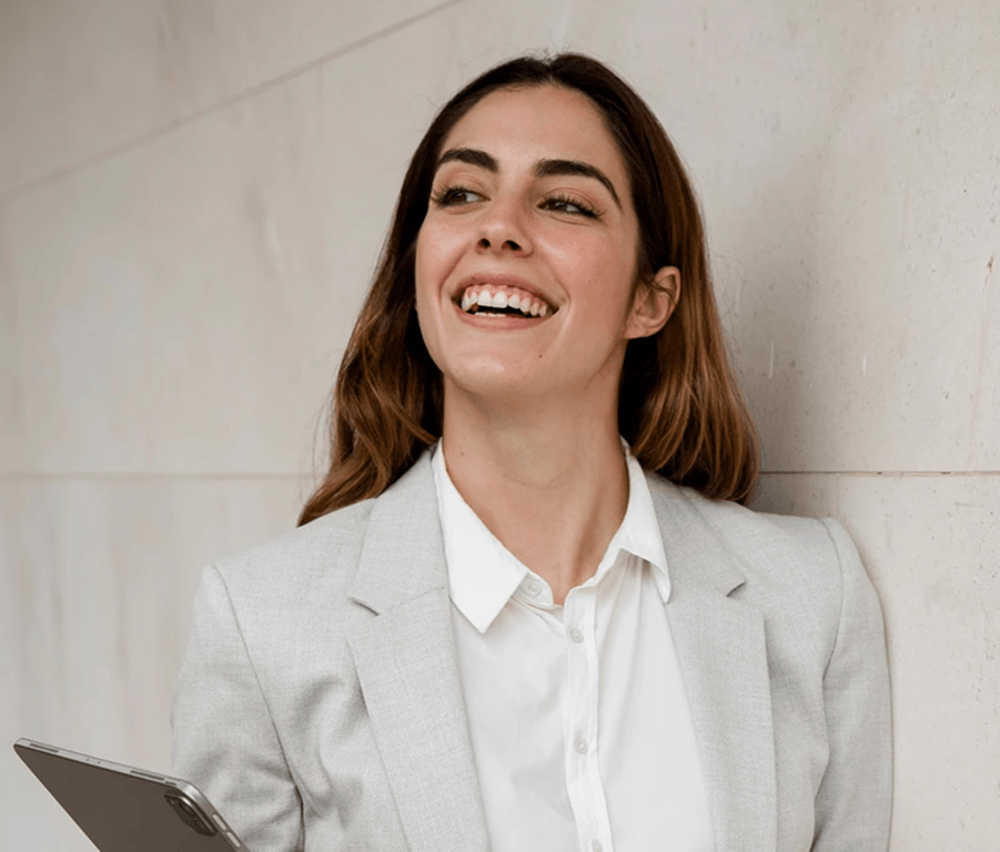 Smiling software consultant holding a tablet