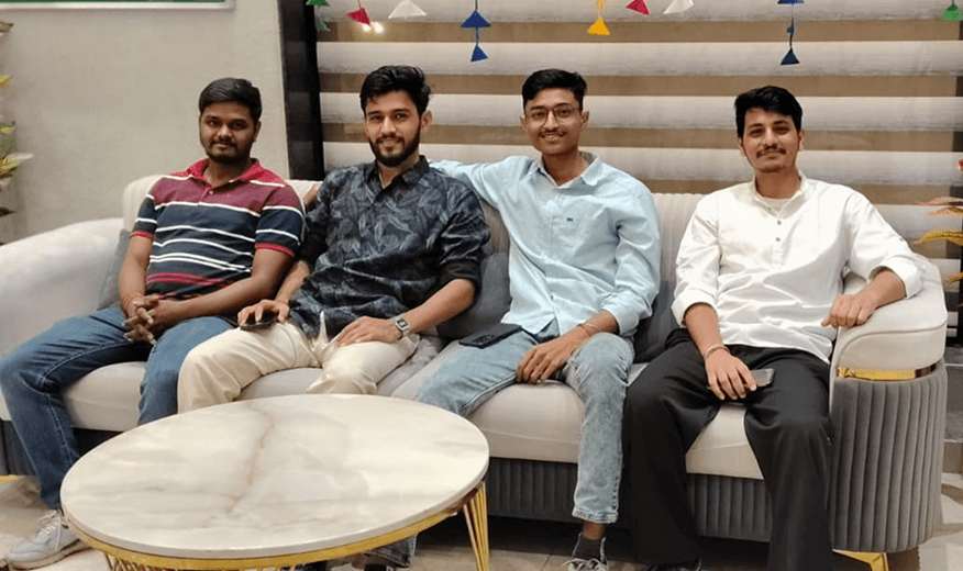 Team sofa posing